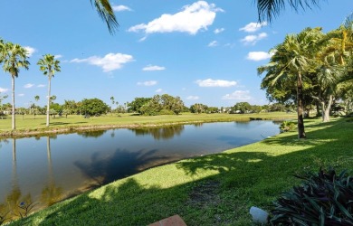 Stunning 3-level with breathtaking golf course and water views on Country Club of Miami in Florida - for sale on GolfHomes.com, golf home, golf lot