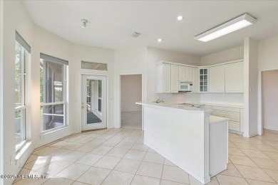LOCATION, LOCATION - LOVELY MARSH VIEW HOME LOCATED IN THE on Queens Harbour Yacht and Country Club in Florida - for sale on GolfHomes.com, golf home, golf lot