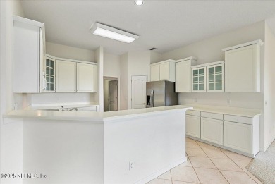 LOCATION, LOCATION - LOVELY MARSH VIEW HOME LOCATED IN THE on Queens Harbour Yacht and Country Club in Florida - for sale on GolfHomes.com, golf home, golf lot