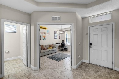 Stunning 4BD/3.5BA Pool Home with Tesla Solar System on an on Orange County National Golf Center and Lodge in Florida - for sale on GolfHomes.com, golf home, golf lot