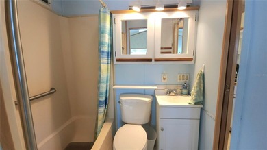 ENJOY THE WATER VIEW FROM THIS TWO BEDROOM 1 1/2 BATH MOBILE on River Run Golf Links in Florida - for sale on GolfHomes.com, golf home, golf lot