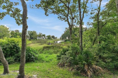 LOCATION, LOCATION - LOVELY MARSH VIEW HOME LOCATED IN THE on Queens Harbour Yacht and Country Club in Florida - for sale on GolfHomes.com, golf home, golf lot