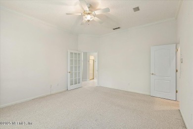 LOCATION, LOCATION - LOVELY MARSH VIEW HOME LOCATED IN THE on Queens Harbour Yacht and Country Club in Florida - for sale on GolfHomes.com, golf home, golf lot