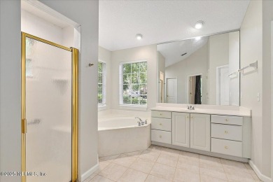 LOCATION, LOCATION - LOVELY MARSH VIEW HOME LOCATED IN THE on Queens Harbour Yacht and Country Club in Florida - for sale on GolfHomes.com, golf home, golf lot