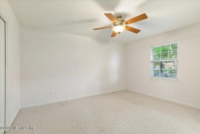 LOCATION, LOCATION - LOVELY MARSH VIEW HOME LOCATED IN THE on Queens Harbour Yacht and Country Club in Florida - for sale on GolfHomes.com, golf home, golf lot
