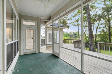 LOCATION, LOCATION - LOVELY MARSH VIEW HOME LOCATED IN THE on Queens Harbour Yacht and Country Club in Florida - for sale on GolfHomes.com, golf home, golf lot