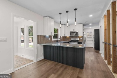The perfect blend of modern luxury, historic charm, & on John A. White Golf Course in Georgia - for sale on GolfHomes.com, golf home, golf lot