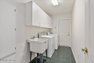 LOCATION, LOCATION - LOVELY MARSH VIEW HOME LOCATED IN THE on Queens Harbour Yacht and Country Club in Florida - for sale on GolfHomes.com, golf home, golf lot