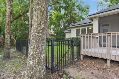 LOCATION, LOCATION - LOVELY MARSH VIEW HOME LOCATED IN THE on Queens Harbour Yacht and Country Club in Florida - for sale on GolfHomes.com, golf home, golf lot