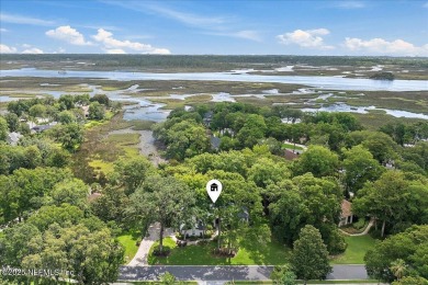 LOCATION, LOCATION - LOVELY MARSH VIEW HOME LOCATED IN THE on Queens Harbour Yacht and Country Club in Florida - for sale on GolfHomes.com, golf home, golf lot