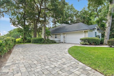 LOCATION, LOCATION - LOVELY MARSH VIEW HOME LOCATED IN THE on Queens Harbour Yacht and Country Club in Florida - for sale on GolfHomes.com, golf home, golf lot