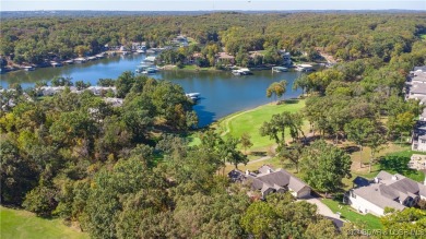 STUNNING lakeview villa situated on the 7th hole of Missouri's on The Club At Porto Cima in Missouri - for sale on GolfHomes.com, golf home, golf lot