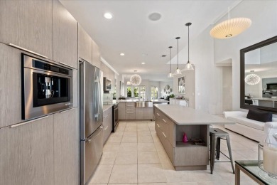 Introducing 2623 Muirfield Court--a tastefully updated on Palm Beach Polo and Country Club in Florida - for sale on GolfHomes.com, golf home, golf lot