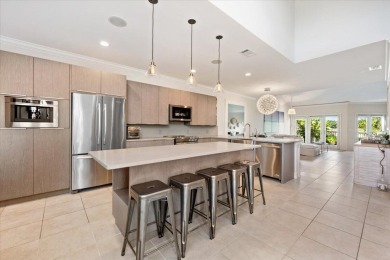 Introducing 2623 Muirfield Court--a tastefully updated on Palm Beach Polo and Country Club in Florida - for sale on GolfHomes.com, golf home, golf lot