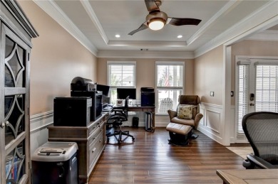 Nestled in a serene cul-de-sac, this meticulously maintained on Reunion Golf Club in Georgia - for sale on GolfHomes.com, golf home, golf lot