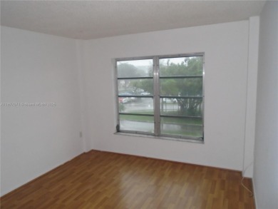 Must-see condo in Inverrary at a great price! AND LOCATION  2/2 on Inverrary Country Club in Florida - for sale on GolfHomes.com, golf home, golf lot