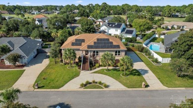 Welcome to this elevated Gulf Breeze retreat where timeless on Tiger Point Golf and Country Club in Florida - for sale on GolfHomes.com, golf home, golf lot