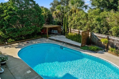 Welcome to this elevated Gulf Breeze retreat where timeless on Tiger Point Golf and Country Club in Florida - for sale on GolfHomes.com, golf home, golf lot