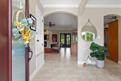 Welcome to this elevated Gulf Breeze retreat where timeless on Tiger Point Golf and Country Club in Florida - for sale on GolfHomes.com, golf home, golf lot