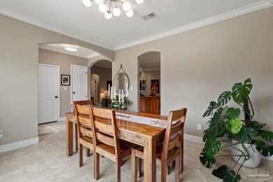 Welcome to this elevated Gulf Breeze retreat where timeless on Tiger Point Golf and Country Club in Florida - for sale on GolfHomes.com, golf home, golf lot