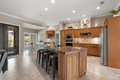 Welcome to this elevated Gulf Breeze retreat where timeless on Tiger Point Golf and Country Club in Florida - for sale on GolfHomes.com, golf home, golf lot