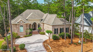 A home built for comfort and entertaining awaits you.  The front on Ocean Ridge Plantation in North Carolina - for sale on GolfHomes.com, golf home, golf lot