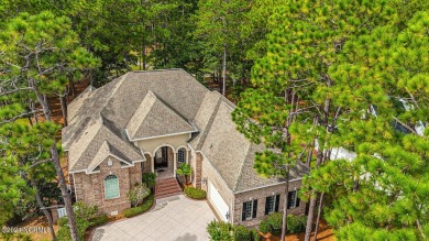 A home built for comfort and entertaining awaits you.  The front on Ocean Ridge Plantation in North Carolina - for sale on GolfHomes.com, golf home, golf lot