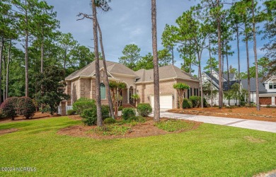 A home built for comfort and entertaining awaits you.  The front on Ocean Ridge Plantation in North Carolina - for sale on GolfHomes.com, golf home, golf lot