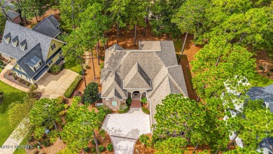 A home built for comfort and entertaining awaits you.  The front on Ocean Ridge Plantation in North Carolina - for sale on GolfHomes.com, golf home, golf lot