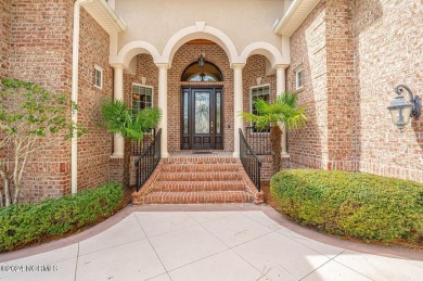 A home built for comfort and entertaining awaits you.  The front on Ocean Ridge Plantation in North Carolina - for sale on GolfHomes.com, golf home, golf lot