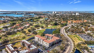 Welcome to this bright and spacious 2-bedroom, 2-bath on Pasadena Yacht and Country Club in Florida - for sale on GolfHomes.com, golf home, golf lot