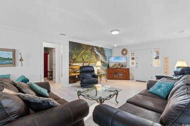 This fully furnished, spacious 4-bedroom, 3-bath raised beach on Beachwood Golf Club in South Carolina - for sale on GolfHomes.com, golf home, golf lot