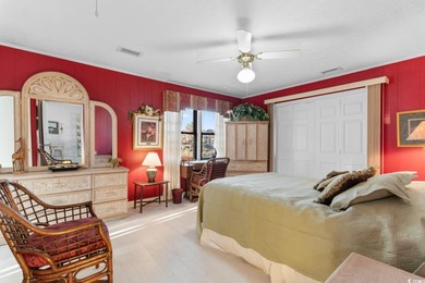 This fully furnished, spacious 4-bedroom, 3-bath raised beach on Beachwood Golf Club in South Carolina - for sale on GolfHomes.com, golf home, golf lot