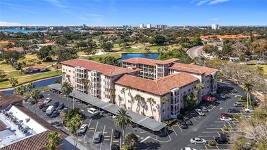 Welcome to this bright and spacious 2-bedroom, 2-bath on Pasadena Yacht and Country Club in Florida - for sale on GolfHomes.com, golf home, golf lot