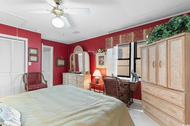 This fully furnished, spacious 4-bedroom, 3-bath raised beach on Beachwood Golf Club in South Carolina - for sale on GolfHomes.com, golf home, golf lot