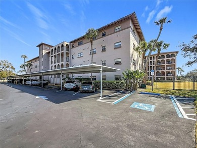 Welcome to this bright and spacious 2-bedroom, 2-bath on Pasadena Yacht and Country Club in Florida - for sale on GolfHomes.com, golf home, golf lot