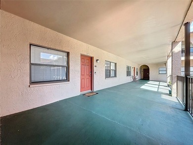 Welcome to this bright and spacious 2-bedroom, 2-bath on Pasadena Yacht and Country Club in Florida - for sale on GolfHomes.com, golf home, golf lot