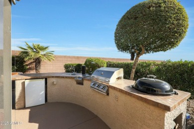 Welcome home to this extended Verde with upgrades in all of the on Sun City Grand Golf Couse and Club in Arizona - for sale on GolfHomes.com, golf home, golf lot