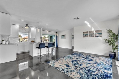 Stunning Coastal Contemporary with Sailboat Access | Punta Gorda on Saint Andrews South Golf Club in Florida - for sale on GolfHomes.com, golf home, golf lot