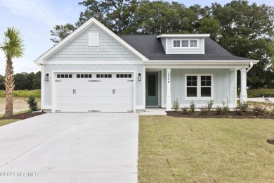 Welcome to beach life in this adorable, easy to live in home on Brick Landing Plantation Yacht and Golf Club in North Carolina - for sale on GolfHomes.com, golf home, golf lot