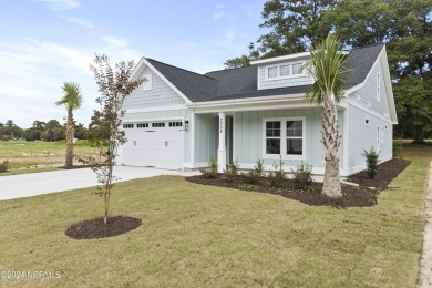 Welcome to beach life in this adorable, easy to live in home on Brick Landing Plantation Yacht and Golf Club in North Carolina - for sale on GolfHomes.com, golf home, golf lot