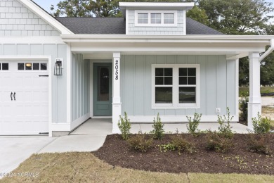 Welcome to beach life in this adorable, easy to live in home on Brick Landing Plantation Yacht and Golf Club in North Carolina - for sale on GolfHomes.com, golf home, golf lot