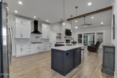 Seller's job transfer brings this barely lived in -one year old on Tellico Village Golf Club in Tennessee - for sale on GolfHomes.com, golf home, golf lot