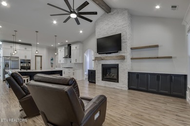 Seller's job transfer brings this barely lived in -one year old on Tellico Village Golf Club in Tennessee - for sale on GolfHomes.com, golf home, golf lot