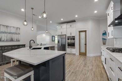 Seller's job transfer brings this barely lived in -one year old on Tellico Village Golf Club in Tennessee - for sale on GolfHomes.com, golf home, golf lot