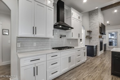 Seller's job transfer brings this barely lived in -one year old on Tellico Village Golf Club in Tennessee - for sale on GolfHomes.com, golf home, golf lot