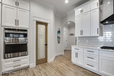 Seller's job transfer brings this barely lived in -one year old on Tellico Village Golf Club in Tennessee - for sale on GolfHomes.com, golf home, golf lot