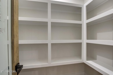 Seller's job transfer brings this barely lived in -one year old on Tellico Village Golf Club in Tennessee - for sale on GolfHomes.com, golf home, golf lot