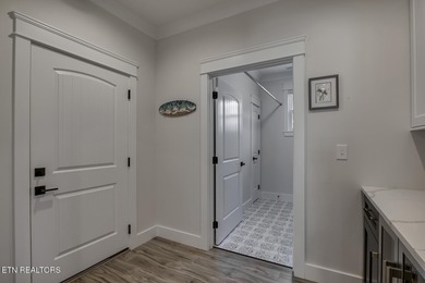 Seller's job transfer brings this barely lived in -one year old on Tellico Village Golf Club in Tennessee - for sale on GolfHomes.com, golf home, golf lot