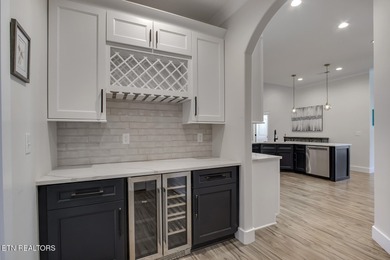 Seller's job transfer brings this barely lived in -one year old on Tellico Village Golf Club in Tennessee - for sale on GolfHomes.com, golf home, golf lot